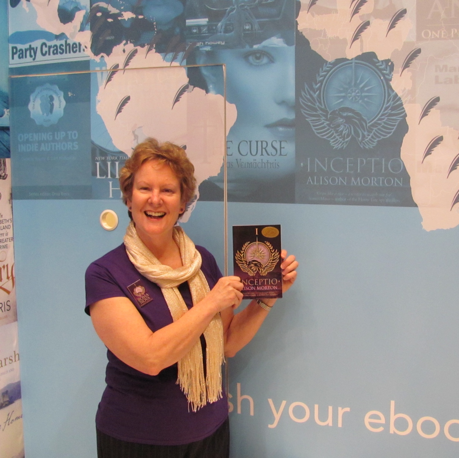 Alison with early copy of INCEPTIO on the Kobo stand at the 2014 London Book Fair