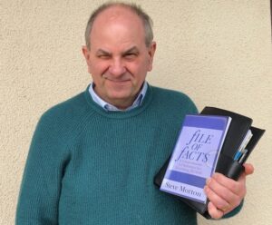 Photo of Steve Morton holding his new book File of Facts