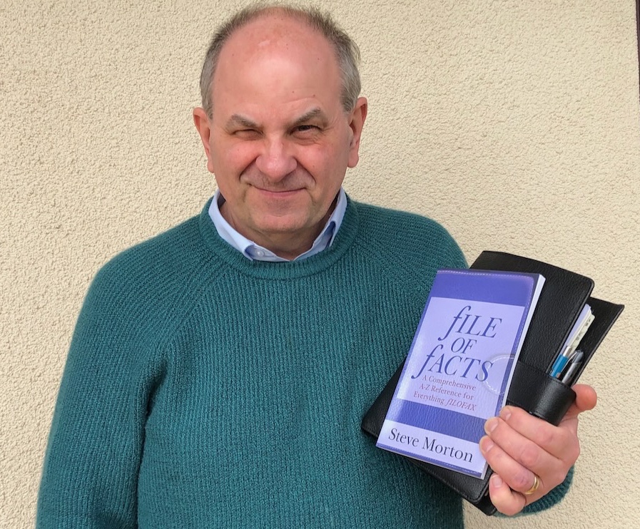 Photo of Steve Morton holding his new book File of Facts and a Filofax organiser