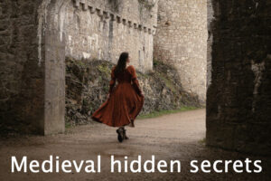 Woman walking through medieval gate